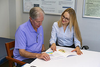 Katrina Long with Client